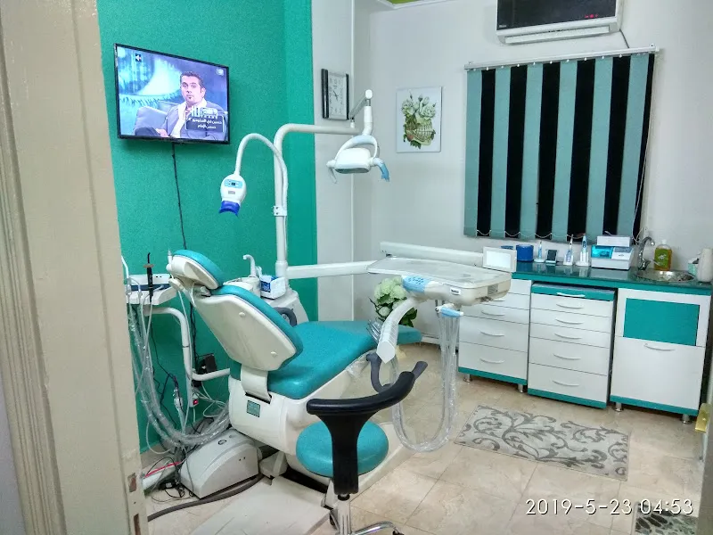 دكتور عادل ربيع محمد-cure dental clinic